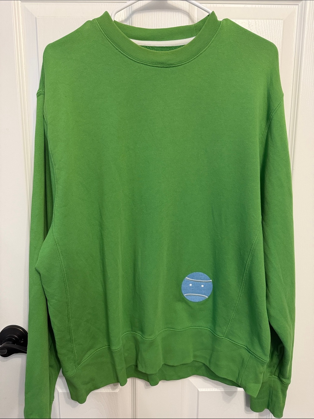 Tory Burch Sport sweatshirt. Size Med. Green with blue felt tennis ball desig